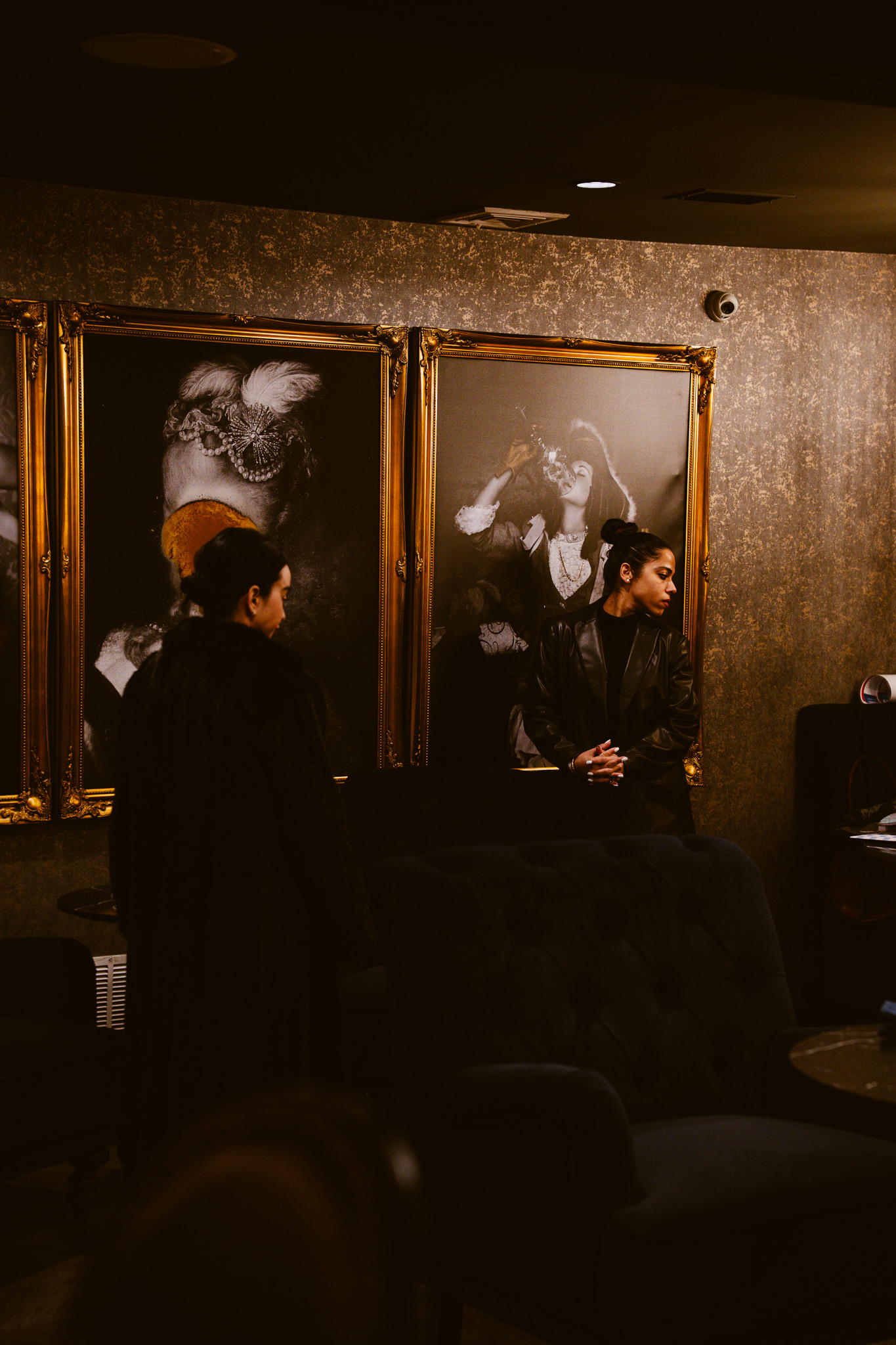 Intimate seating area bathed in warm candlelight